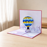Carte pop-up 3D Montgolfière Rêveuse Personnalisable – Couleurs et Motifs de Couverture, Design en Papier Multicouche, DIY Anniversaire Personnalisé