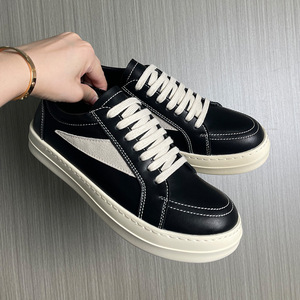 Chaussures décontractées de haute qualité pour hommes et femmes, avec semelles intérieures en caoutchouc EVA noir et rose. - Product Image 1