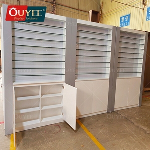 Vitrina de pared con logotipo personalizado de lujo para tiendas de humo Muebles de plástico y servicio de diseño para decoración de tiendas y tabacalerías - Product Image 1