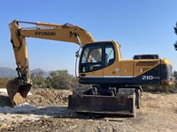 Excavatrice sur pneus Hyundai 210W-9 d'occasion de 20,5 tonnes avec moteur diesel, moteur à engrenages et pompe à vendre
