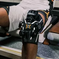 Masseur de genou portable avec chaleur, cryothérapie et compression d'air pour la récupération sportive et le soulagement quotidien