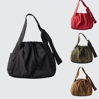Sac à bandoulière matelassé tendance pour femme, léger, avec large sangle et plusieurs poches pour le quotidien