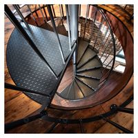 Escalier en colimaçon sur mesure, gain de place, design artistique, esthétique moderne, installation facile, escalier pour petit appartement