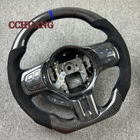 Volante de Fibra de Carbono con Base Plana en Alcántara, un Accesorio Interior Personalizado para Mitsubishi Lancer EVO X