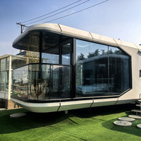 Maison préfabriquée personnalisée de conception industrielle, type Apple Pod Capsule, pour salle d'activités, boutique mobile, bureau, petite maison, guichet de billetterie
