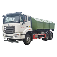 Camion à ordures hydraulique d'ascenseur de bras de crochet de Sinotruck Howo 6*4 4*2 avec le Offre Spéciale de seau de décharge