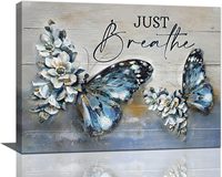 Tableau mural sur toile « JUST BREATHE » avec citation inspirante et motif floral papillon, décoration encadrée bleue et blanche