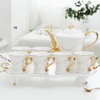 नई शैली आधुनिक सफेद और सोना शाही लक्जरी दोपहर सिरेमिक चाय और कॉफी सेट के साथ अरबी चाय का सेट उपहार बॉक्स