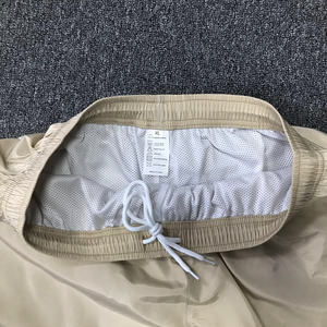 ผู้ผลิตเสื้อผ้ากีฬาแบบมืออาชีพ กางเกงกีฬาขาสั้นผ้าแคนวาสแบบไม่ทอ แห้งเร็ว ป้องกันรังสียูวี สไตล์วินเทจสำหรับผู้ชาย แบบสั่งทำได้ - Product Image 4