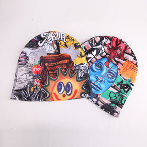 Logo personalizzato uomo donna tutto su stampa sport berretto acrilico berretto con teschio senza polsino cappello invernale Jacquard berretto reversibile personalizzato - Product Image 6