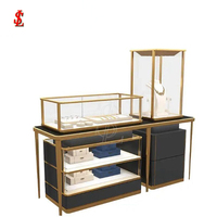 Vitrine de présentation de bijoux de luxe noir et or, ensemble de comptoirs de boutique multi-niveaux avec tour LED et étagères ouvertes