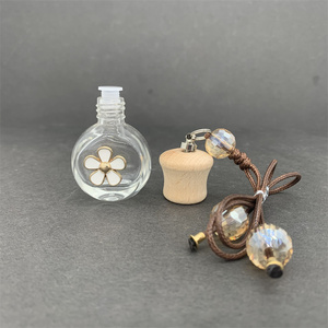 ขวดน้ำหอมในรถแบบแขวนขนาด10มล.,ขวดจี้สร้อยคอพร้อมลูกปัดคริสตัลรูปทรงกลีบดอกไม้โลหะ8มล. - Product Image 3