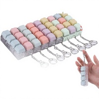 Pendentif de clavier 4 touches en plastique Macaron, couleurs assorties, pour décompression par pression des doigts, idéal pour la décoration de sacs à dos