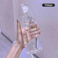 Bouteille d'eau personnalisée de 500ml 750ml en verre borosilicaté de qualité supérieure avec manchon noir