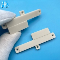 Base étagée en nitrure d'aluminium (AlN) usinée sur mesure par CNC avec tolérance stricte pour l'emballage de semi-conducteurs