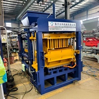 Machine automatique de fabrication de blocs vibratoires QT4-15B pour blocs de construction en béton