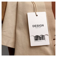 Étiquette de vêtement de luxe personnalisée avec logo, nom, anneau métallique, finition gaufrée/imprimée, couleur personnalisée pour vêtements et chaussures