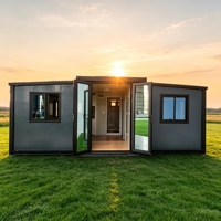 Maison conteneur préfabriquée extensible Shinestone à double aile, villa modulaire compacte avec design extérieur personnalisé