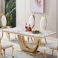 Table basse moderne en marbre doré de qualité supérieure avec structure en acier inoxydable, design populaire pour salon