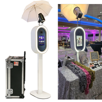 Kiosque photo ovale et cabine photo selfie personnalisable pour iPad et DSLR avec flight case et éclairage RGB pour mariage
