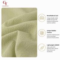 Tissu bulle tissé double face hautement élastique, doux, de poids moyen, infroissable, à mémoire de forme, antistatique, 100 % polyester, pour chemisier