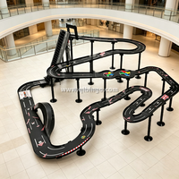 Dispositif interactif et expérimental de piste à billes gravitationnelle avec escaliers électriques pour optimiser la décélération de la piste à billes à niveau moulin à vent