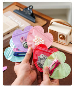 Sacs à bijoux biodégradables en PVC couleur macaron, personnalisés en forme de cœur avec fermeture éclair, pour boucles d'oreilles, bracelets, colliers, lunettes - Vente en gros - Product Image 6