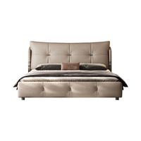 Cadre de lit en cuir véritable de luxe, design moderne minimaliste avec boucles métalliques, lit king size rembourré pour chambre principale