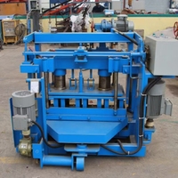 Machine automatique de fabrication de blocs creux et de pavés en béton QT 40 3A avec PLC et moteur hydraulique, garantie 1 an