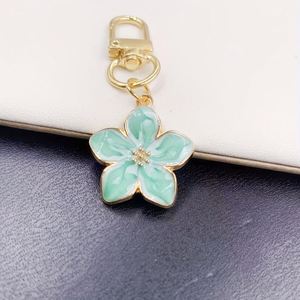 New Cross-border <b>Hot</b> Sale Korean Style Simple Cute Girl Pear Flower Zinc Alloy Pendant Keychain <b>Bag</b> Small Gift Model 000 - Product Image 4