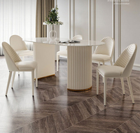 Ensemble table et chaises de salle à manger de luxe léger, moderne, simple, ovale, couleur crème, avec plaque de roche