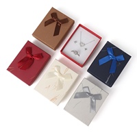 Boîte à bijoux avec couvercle nœud papillon pour bagues, pendentifs, bracelets, boucles d'oreilles, accessoires, boîte cadeau de bijoux tendance, boîtes à bijoux en papier personnalisées