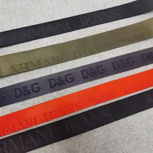 Prezzo di fabbrica cintura stampata con Logo ecologico 1 1.5 pollici in tinta unita con Logo in tessuto Jacquard con tracolla in Nylon personalizzato