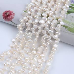 Zhuji Pearl Wholesale 7-8mm Baroque Three-Hole Freshwater Pearl String Natural <b>White</b> Color with Two <b>Sided</b> Bald Holes - Product Image 1