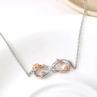 Collier en argent sterling 925 plaqué rhodium et plaqué or rose avec symbole de l'infini de la fleur de rose