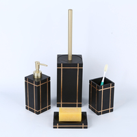 Ensemble de 4 pièces pour salle de bain en résine noire Ensemble d'accessoires de salle de bain en polyrésine de luxe avec design à rayures dorées