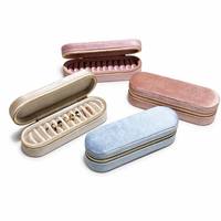 Boîte à bijoux de voyage en velours en forme de pilule, étui à anneaux à 11 compartiments avec fermeture éclair, portable, vente en gros, logo personnalisé, cadeau pour femmes