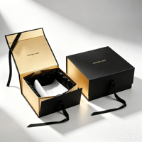 Boîte cadeau pliable rigide en carton avec couvercle rabattable et doublure en satin noir pour emballages de luxe et cosmétiques haut de gamme