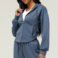 Nouvelle veste zippée de sport automne-hiver pour femme, cardigan à capuche, sweat-shirt ample avec poches, idéal pour le yoga