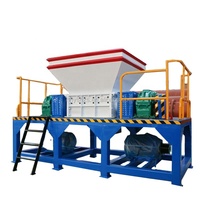 Mini broyeur industriel à double arbre pour pneus de voiture en caoutchouc, palettes, coques de noix de coco, déchets plastiques, pneus usagés, métaux