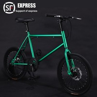 Vélo de route en acier à haute teneur en carbone avec pneus pleins, roue libre, frein à rétropédalage et double frein à disque ; Vélo de route compact à cadre rigide de 20 pouces