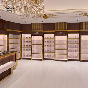 Elegante Vitrina de Madera Dorada para Perfumes, Personalizada, con Kioscos y Diseño Integral para Tiendas y Minoristas - Product Image 1