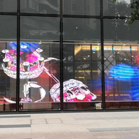 Écran LED transparent 3D extérieur P3.9-7.8 pour mur en verre et publicité vidéo en magasin
