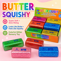 Jouet anti-stress souple en forme de bâton de beurre avec perles scintillantes dorées
