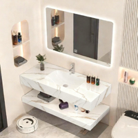 Meuble-lavabo mural de luxe moderne en marbre 2026 avec miroir de maquillage intelligent et robinet personnalisable pour salle de bain d'hôtel