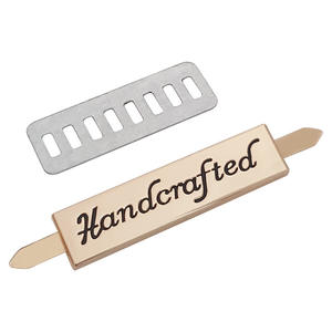 Bolso de mano <span class=keywords><strong>con</strong></span> logotipo metálico grabado personalizado Midea, bolso <span class=keywords><strong>con</strong></span> placa de marca, logotipo metálico, tela de herrajes, logotipo metálico para <span class=keywords><strong>camisetas</strong></span>, bolsos de mano, natación - Product Image 1