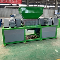 Déchiqueteuse à double arbre en plastique durable, machine de déchiquetage robuste pour le recyclage des déchets plastiques