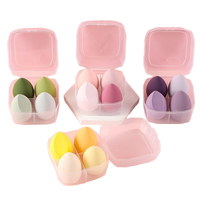 Boîte brevetée à quatre grilles ensemble de houppette avec gourde goutte d'eau biseautée coupe échantillon gratuit oeuf maquillage coton pour la beauté