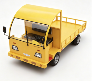 Yellow Electric Flatbed Utility Truck with Enclosed Cab and Open Cargo <b>Bed</b> - Product Image 1