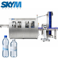 Machine de remplissage, d'étiquetage et d'emballage d'eau automatique de A à Z pour bouteilles en verre/PET